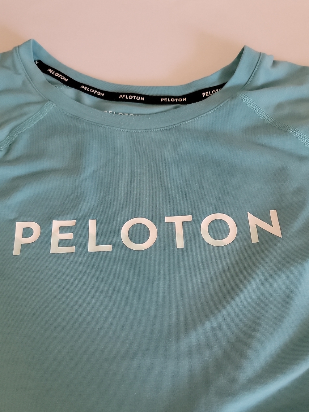 PELOTON MEN'S LIGHT BLUE SHORT SLEEVE PERFORMANCE TEE - Picture 5 of 5